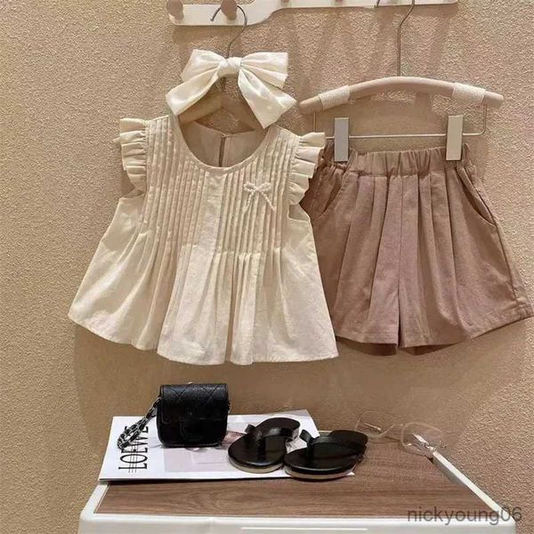 Conjuntos de roupas 2023 primavera verão novas meninas conjunto de roupas bonito pouco voando manga plissada boneca camisa + bolso shorts 2 pçs moda crianças outfit