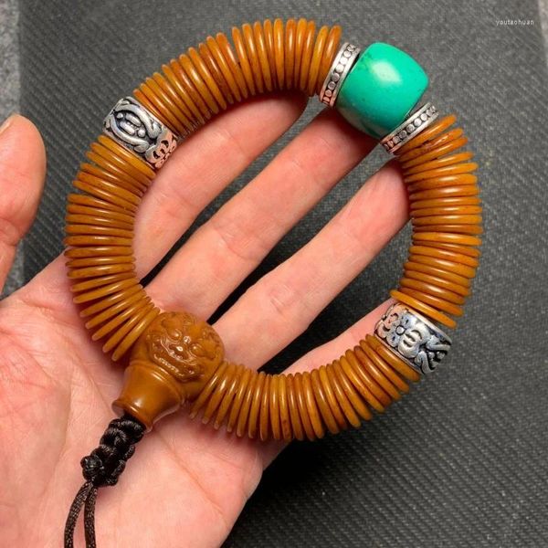 Filo di perline di osso di yak 108 pezzi Bracciale a mano con spirito antico riflusso