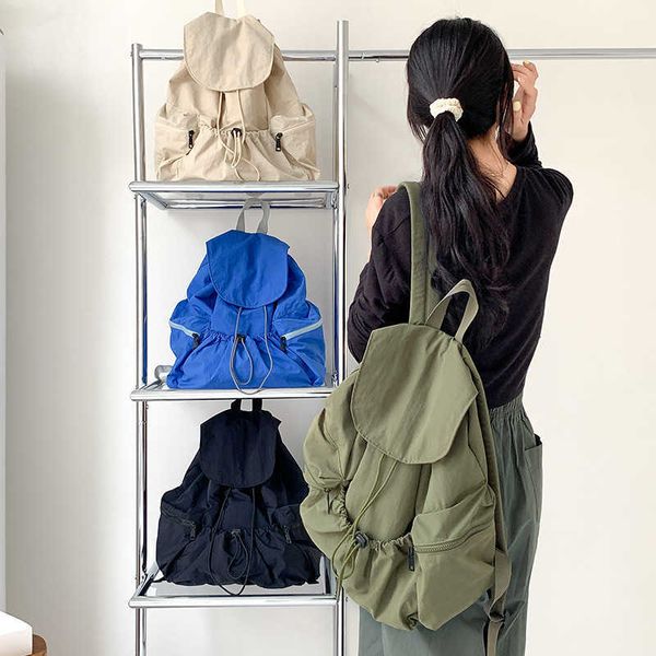 Bolsas de lona de nylon de nicho coreano japonês, mochilas minimalistas casuais, mochila diária prática feminina de grande capacidade 240315