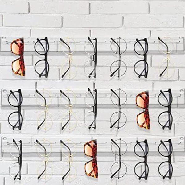 Montature per occhiali da sole Espositore per occhiali a 7 fori Scaffale moderno trasparente a parete con appendiabiti in acrilico
