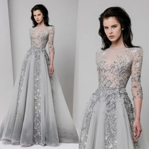 Tony Ward 2024 Abiti lunghi da ballo in argento Perline di lusso Appliqued Scollo gioiello Abiti da sera Paillettes Corpetto illusione Abito da festa formale