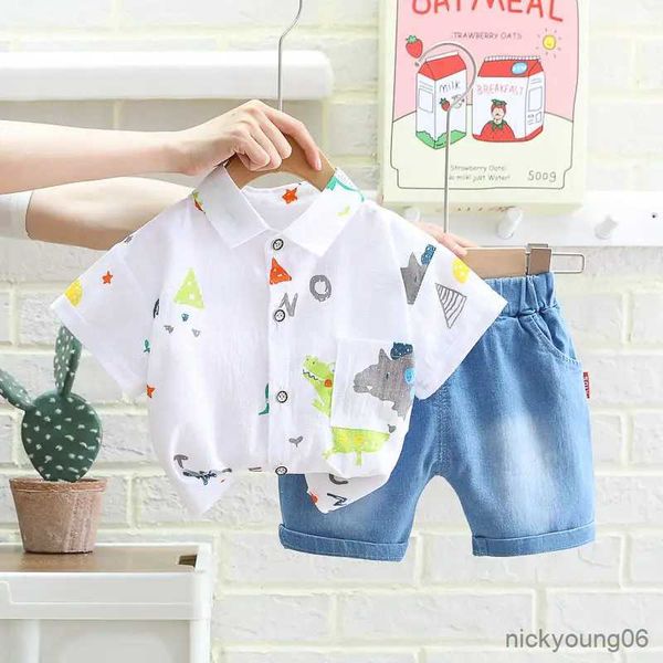 Set di abbigliamento Nuova estate Casual Neonato Ragazzo Vestiti per bambini Camicia di dinosauro Top Pantaloni 2 pezzi / set Abiti in cotone per bambini Abbigliamento completo