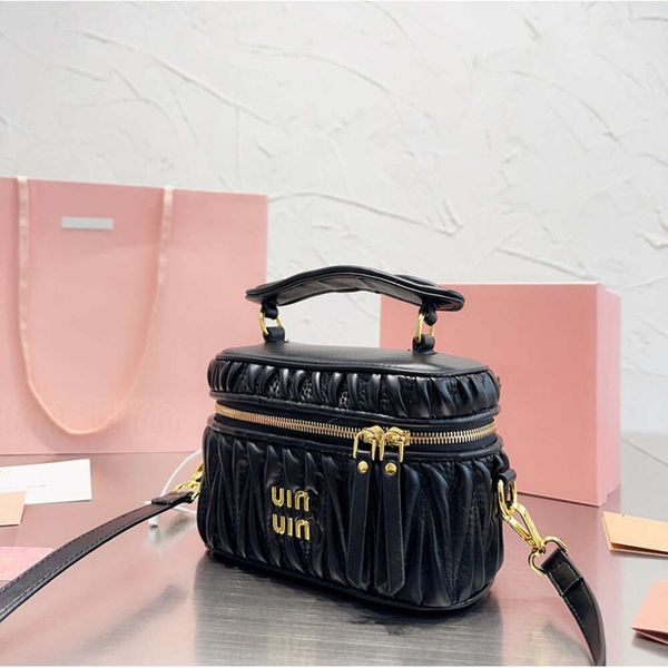 Vendita di liquidazione della borsa di design Miao Bag Donna 2024 Nuovo Wander Materazza Piccolo trucco profumato a spalla con motivo a scacchi