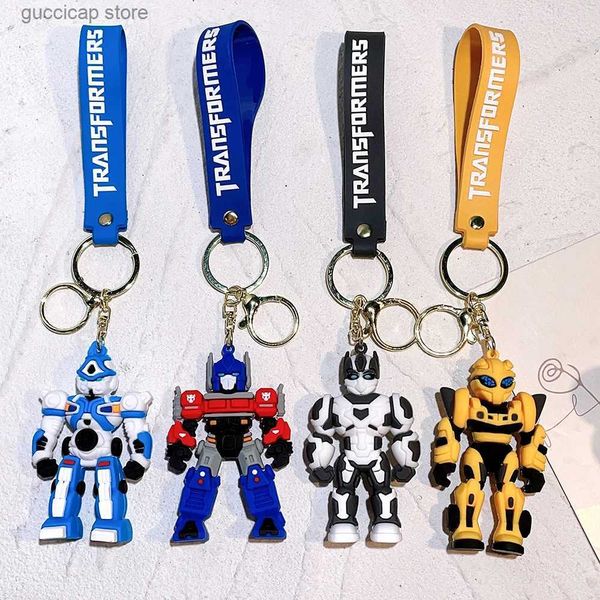 Schlüsselanhänger Lanyards Neue kreative Cartoon-Film-Roboter-Schlüsselanhänger Sile Transformer Auto-Schlüsselanhänger Kinder-Taschen-Anhänger Schlüsselanhänger Freunde Geschenk Charms Y240316