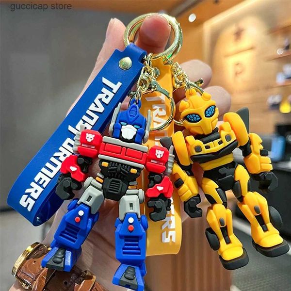 Schlüsselanhänger Lanyards Neue kreative Cartoon-Film-Roboter-Schlüsselanhänger Sile Transformer Auto-Schlüsselanhänger Kinder-Taschen-Anhänger Schlüsselanhänger Freunde Geschenk Charms Y240318