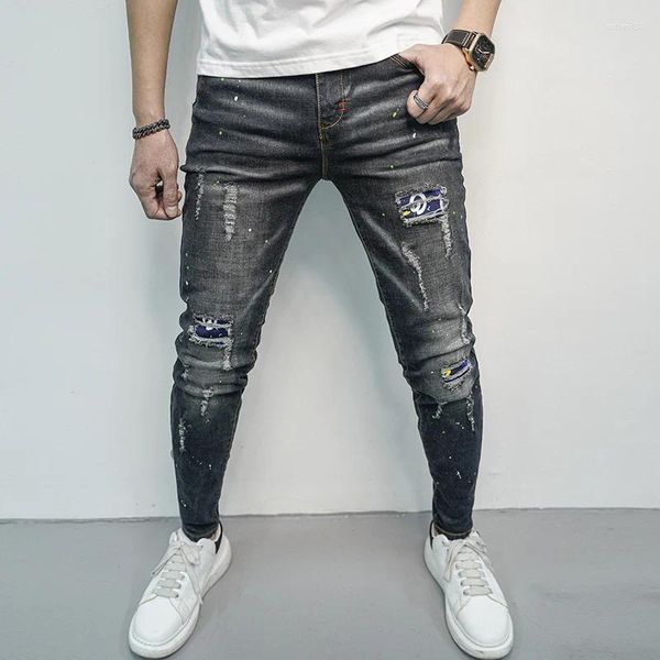 Calças de brim masculinas rua remendo elástico empilhado angustiado perfurado fino ajuste denim calças coreano moda casual calças estreitas