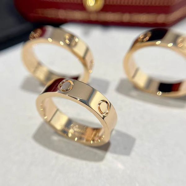 Новый дизайн Design Design Love Ringer 18k золота титанового стального кольца Классическое ювелирное украшение мужское и женское обручальное кольцо современного стиля кольцо