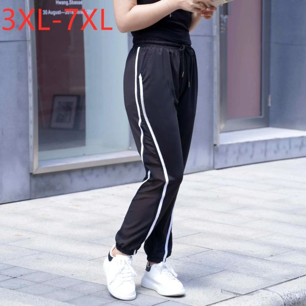 Bottoms New 2022 Ladies Spring Autumn Plus Size calça de corredor para mulheres Grandes faixas pretas soltas Sports Sports Troushers 3xl 4xl 5xl 6xl 7xl