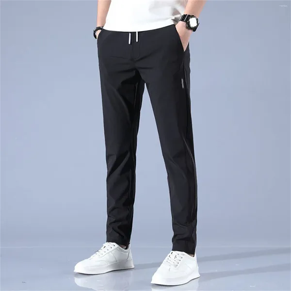 Calças masculinas casuais com bolsos profundos cor sólida solta ajuste calças de jogging moda versão coreana tamanho grande perna reta