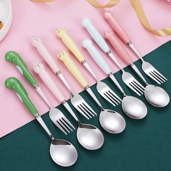 originalità del fumetto Cucchiai forchette in acciaio inossidabile 304 Bambini Manico in ceramica Cucchiaio da zuppa Forchetta da frutta Stoviglie Posate Stoviglie Cena Dessert Posate Scoop SN1