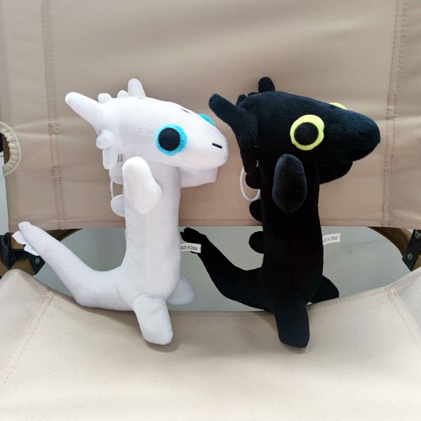 Commercio all'ingrosso di simpatici peluche con drago danzante, bambole di drago bianco e nero, giochi per bambini, compagni di gioco, regali di festa, decorazioni per la casa Buona qualità