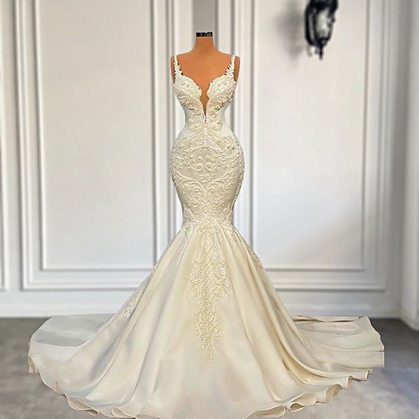 Abito da sposa sexy in raso di pizzo a sirena 2024 Nuovo scollo a V senza maniche Perle Applicazioni di pizzo Dubai Arabo Abiti da sposa africani