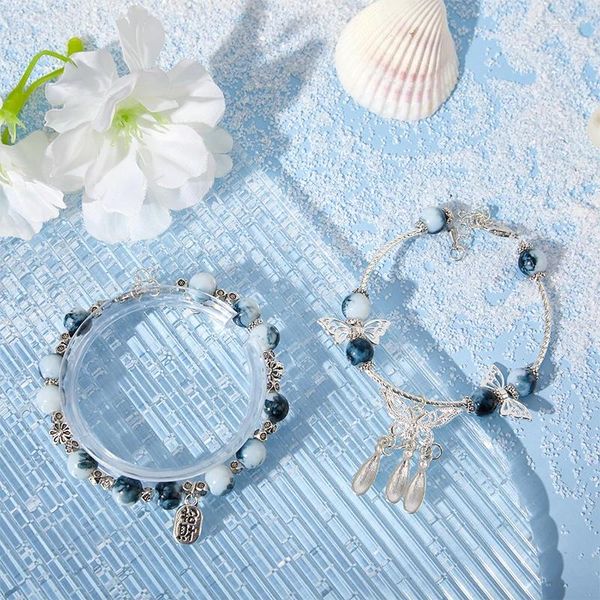 Strand Modische Persönlichkeit Mehrfarbiges Schmetterlings-Quasten-Perlenarmband für Frauen Antikblaues und weißes Porzellan