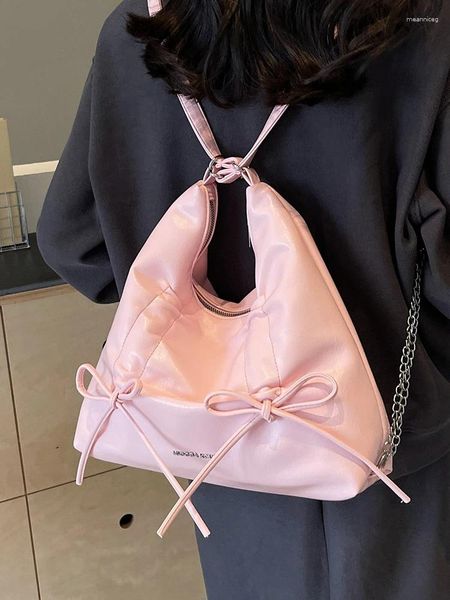 Drawstring pembe büyük kapasiteli PU sırt çantası 2024 serin kız kişiselleştirilmiş 3D yay tasarım fermuar omuz çantaları çok yönlü gidip