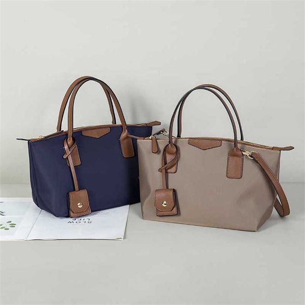 Sacos de ombro chiques emparelhados bolsas de designer tote couro leve saco de deslocamento único ombro moda mulheres bolinho saco 240311