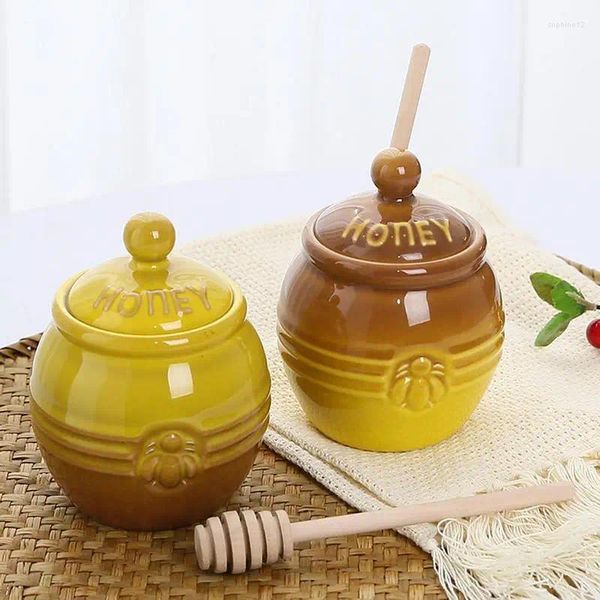 Bottiglie di stoccaggio Dispenser di miele Barattolo di ceramica con contenitore per sciroppo d'api retrò HoneyPot Bastoncino di agitazione in legno Piccolo contenitore