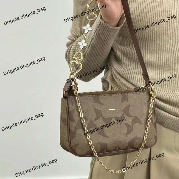 Bolsa de marca de luxo bolsa feminina nova popular pérola mahjong saco clássico flor antiga moda versátil um ombro portátil crossbody axilas para bolsas femininas