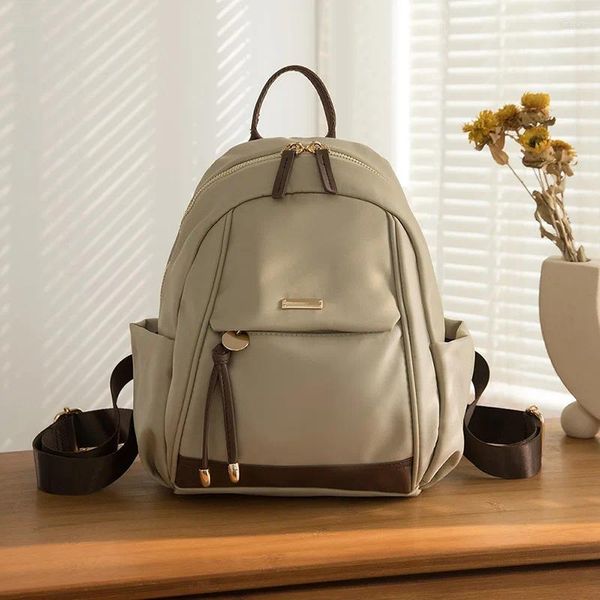 Sacos escolares mini mochila para mulheres 2024 viagens e commuting edição coreana versátil lazer moda oxford pano pequeno