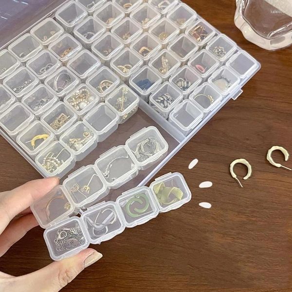 Bolsas de joias Acessórios de moda Caixa de brinco compacta Recipiente transparente para anéis