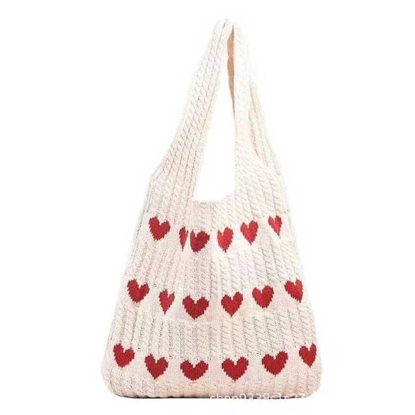 Venda bolsas de ombro para mulheres bolsas tricotadas Bolsas de designer de designers saco de ttete outono pequeno saco de estilista de estilo ocidental simples 240311