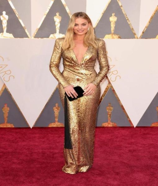 Nuovo Oscar Margot Robbie Abiti da sera dorati Sexy scollo a V profondo Manica lunga Bling Paillettes Abiti da festa celebrità Tappeto rosso Prom D7281493