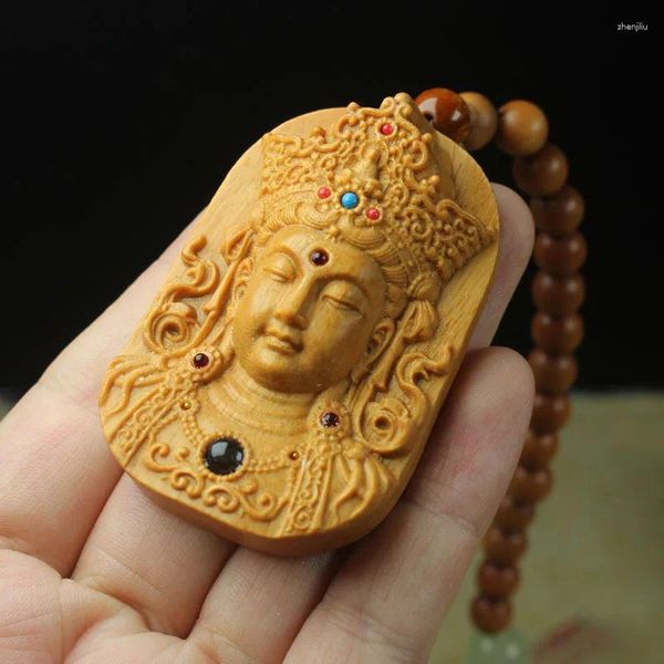 Statua di Buddha con ciondolo stereo Avalokitesvara in legno di sandalo