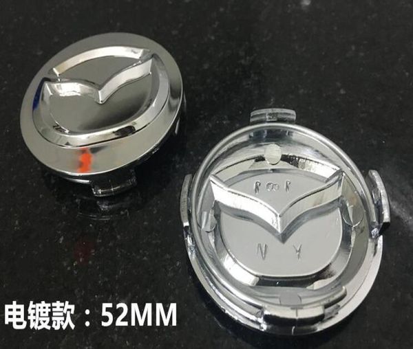 4x TAPPI CENTRALI PER MOZZI RUOTA DI RICAMBIO per MAZDA Full cromati piccoli misura 52mm2776821