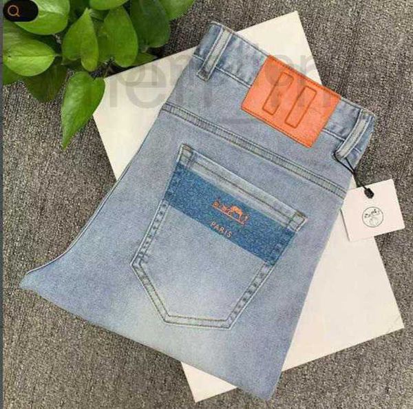 Jeans masculinos designer jeans para homens primavera novo pequeno tubo reto fino ajuste elástico versátil juventude calças de moda coreana tamanho asiático 28-42 EYGE