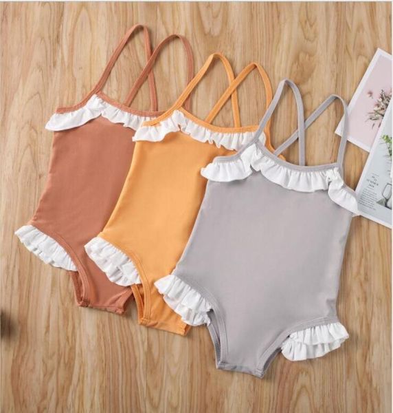 Baby Mädchen Badeanzug Kinder Straps Bikini OnePieces Kind Falbala Rüschen Solide Bademode Baby Sommer Badeanzug Mode Beachwea4265822