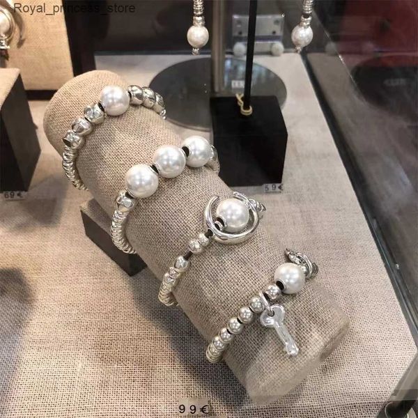 Braccialetti con ciondoli UNODE commercio all'ingrosso manuale femminile spagnolo fatto a mano della fabbrica della fabbrica manuale femminile d'argento della perla della sfera della perla di alta qualità senza spedizione Q240321