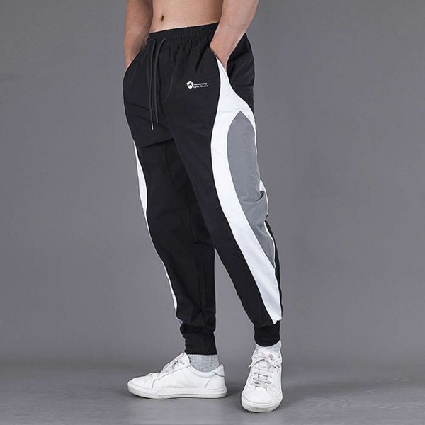 Pantaloni sportivi da uomo di grandi dimensioni Fitness Fast Dry Running Training Nuovo colore a contrasto Loose Bullet