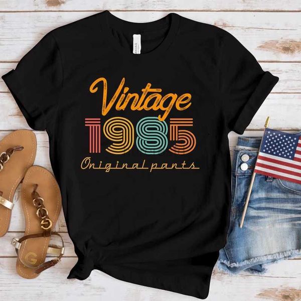 Camiseta feminina (camiseta premium) nova quente retro 1985 camiseta moda feminina verão camiseta lazer manga curta em torno do pescoço camiseta superior 240323