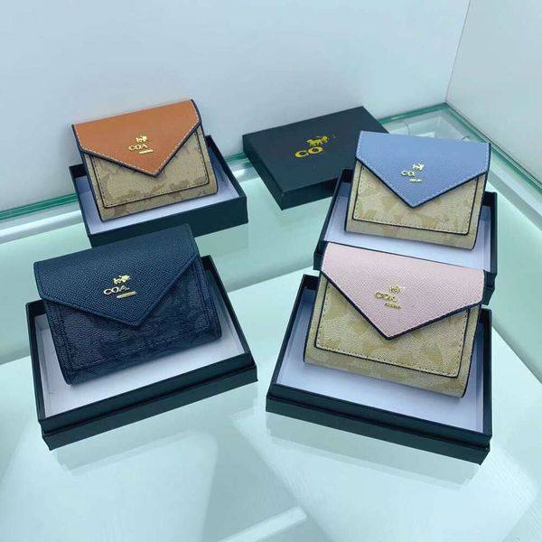 Designer saco marcas doces moda novo estilo kou estilo curto três dobras cor correspondência carteira mulheres bolsa de alta qualidade caixa 240322