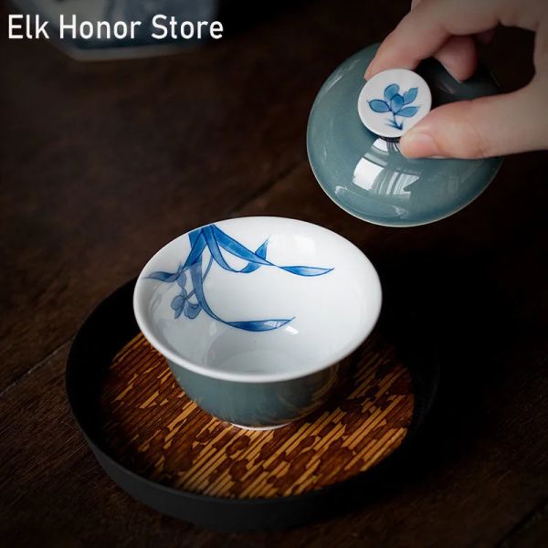 Acessórios 85ml Boutique Bluish Glaze Tea Cerâmica Tureen Painteado de Arte da Orquídea Pura Manor de Tea Manor Gaiwan Com capa Conjunto de chá de Kung Fu de Kung Fu