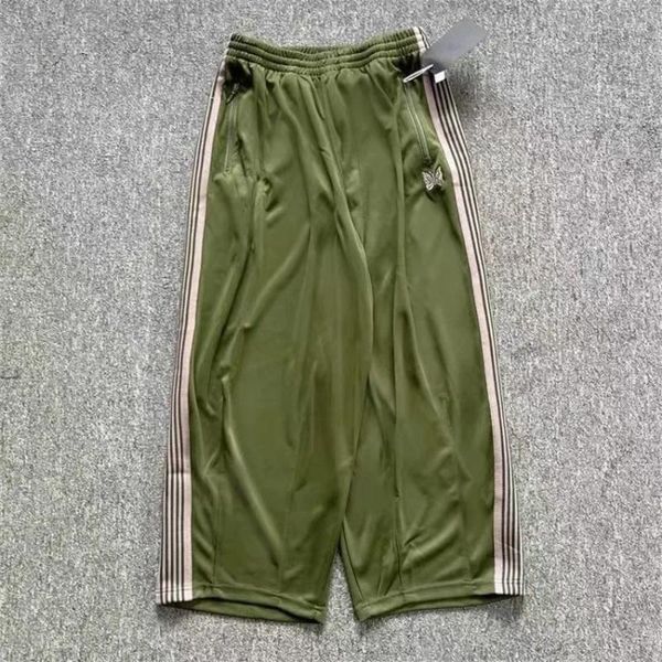 Pantaloni da uomo Y2K Verde Militare Aghi Gamba Larga Uomo Donna Pista Coulisse Pantaloni Sportivi AWGE Pantaloni Sportivi con Farfalla Ricamata