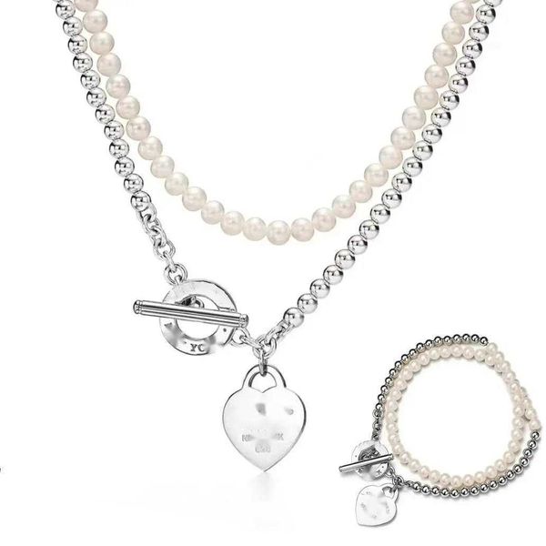 Collana con ciondolo Collana di design di lusso e moda Collana con cuore Ritorna ai gioielli con ciondolo Catena a doppio strato con cuore abbinata a gioielli da festa con collana di perle