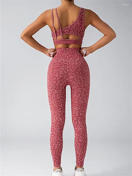 Conjuntos ativos sem costura leopardo impressão yoga conjunto feminino oco para fora cruz volta esporte colheita superior pêssego hip elevador cintura alta calças de fitness 2 pçs terno