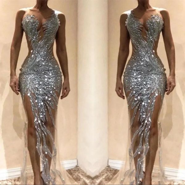 Splendidi abiti da ballo a sirena in argento sexy trasparenti con corpetto in paillettes spaccati lunghi abiti da sera per occasioni da donna realizzati su misura