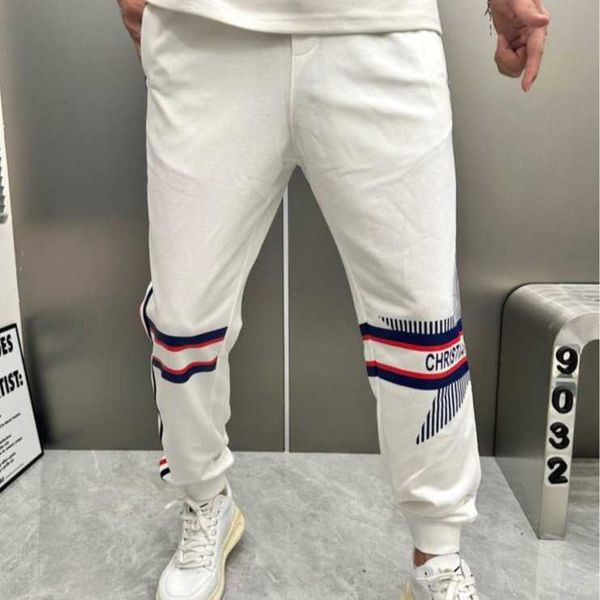 a versão correta de calças casuais soltas para homens primavera americana cinza perna larga adolescentes com cortina sensível