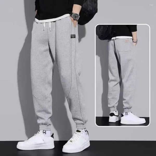 Pantaloni da uomo Sport Pantaloni da jogging ad asciugatura rapida Polsini termoretraibili Uomini alla moda Tinta unita Pantaloni sportivi casual Abbigliamento quotidiano