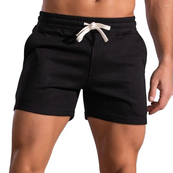 I pantaloncini da uomo migliorano la tua routine di esercizi con i nostri pantaloni corti fitness per palestra e corsa Nero/Grigio scuro/Grigio chiaro