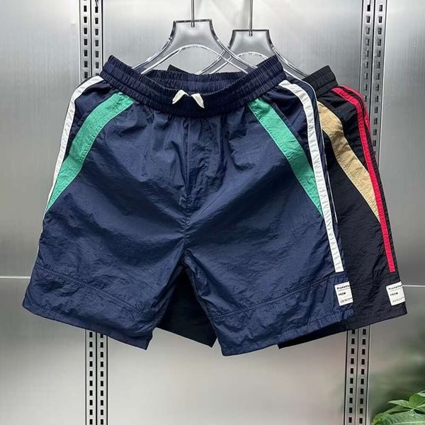 Pantaloncini slim fit versatili a righe laterali da uomo nuovi estivi Pantaloni da spiaggia alla moda sportivi Capris