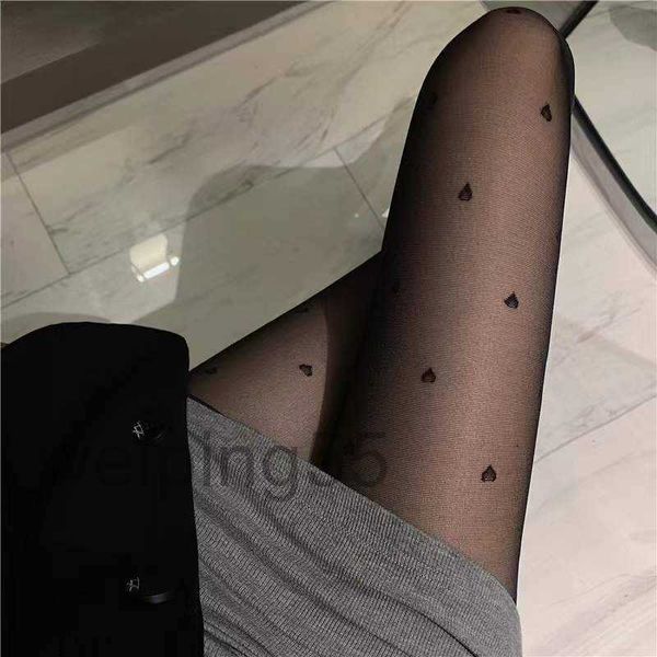 Calze di seta da donna Amore a pois Fiocchi Punti rotondi Calze di seta Gambe nude Strumenti divini Calze di seta estive sottili Collant di seta anti-gancio di seta nera