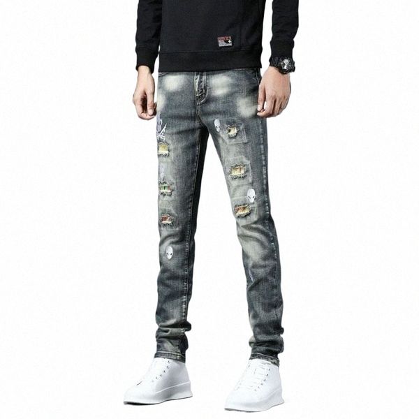 fiable jeans strappati teschio da uomo ricamato patch autunno persalità modello moto pantaloni larghi dritti 45T3 #