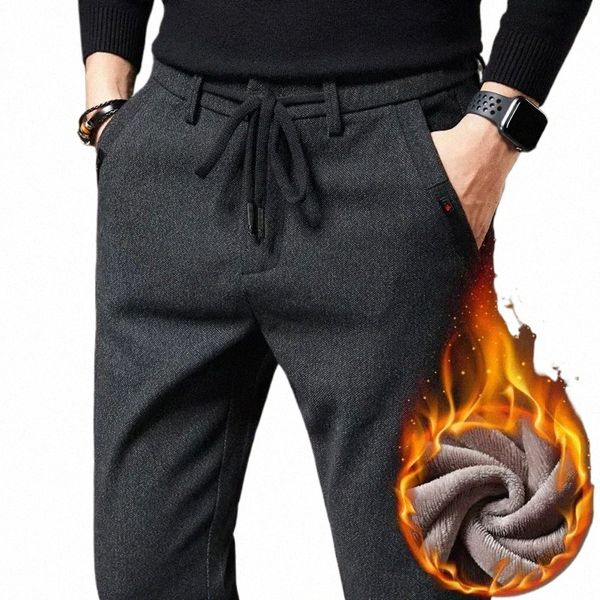 Pantaloni casual caldi dei nuovi uomini di inverno 2024 Fi tessuto spazzolato in pile spesso pantaloni da ufficio sottili di marca maschio nero D4eI #