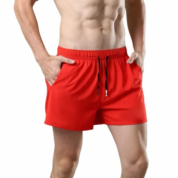 Pantaloncini da uomo 2023 estate sottile nuovo caldo solido casual spiaggia pantaloni corti maschio corsa palestra Fitn traspirante sport quattro punti pantaloni 09AV #