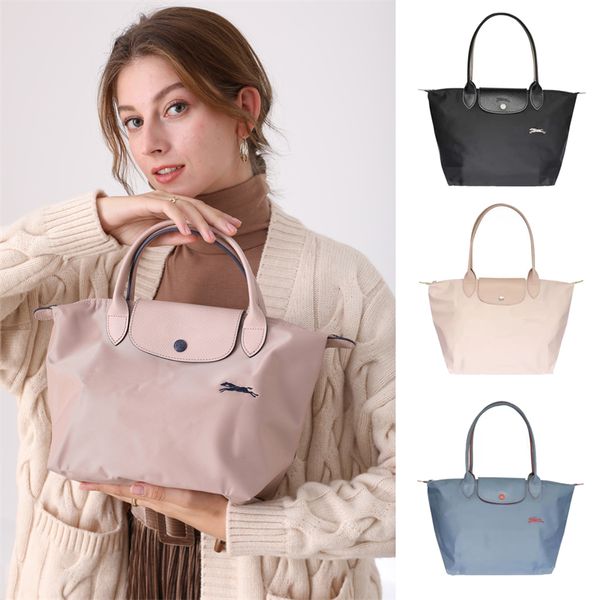 Borsa tote per gnocchi a spalla Hobo da donna alla moda Borsa in nylon di lusso Canva Borsa a tracolla CrossBody Designer per donna da uomo Frizione durante la notte borse shopper per il fine settimana di alta qualità