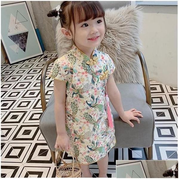 Roupas étnicas 2-9Y Chinês Cheongsam para meninas Amarelo Pavão Floral Impressão Hanfu Vestidos Crianças Manga Curta Qipao Princesa Verão Dro Otjeh