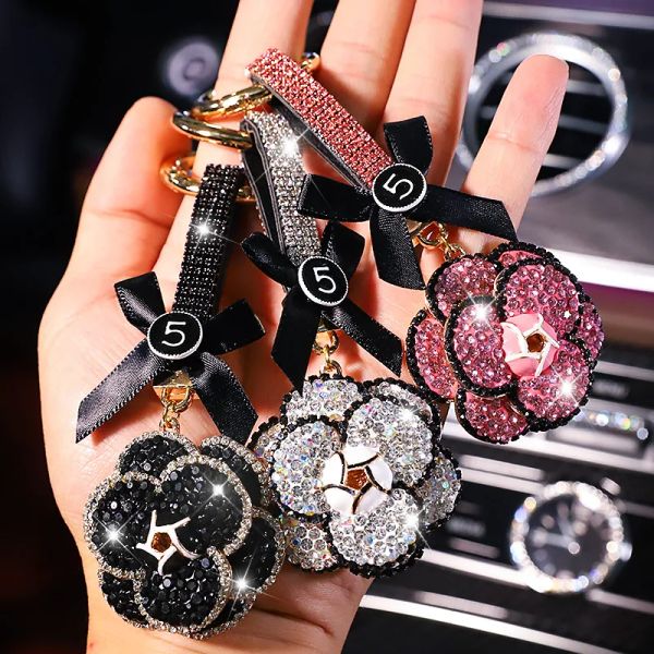 Rotaie moda cristallo diamante camelia fiore portachiavi auto portachiavi strass arco cartone animato portachiavi in metallo accessori auto decorazione