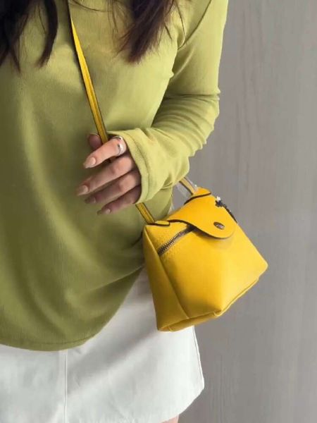 Loja bolsa crossbody exportação barata com luz de luxo pequena para mulheres 2024 uma carta de ombro mão axilas